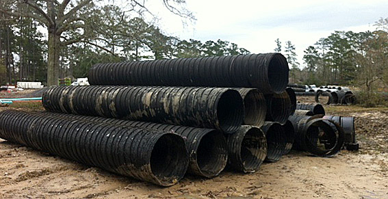 corrugated metal pipe construction job site photo - qsm